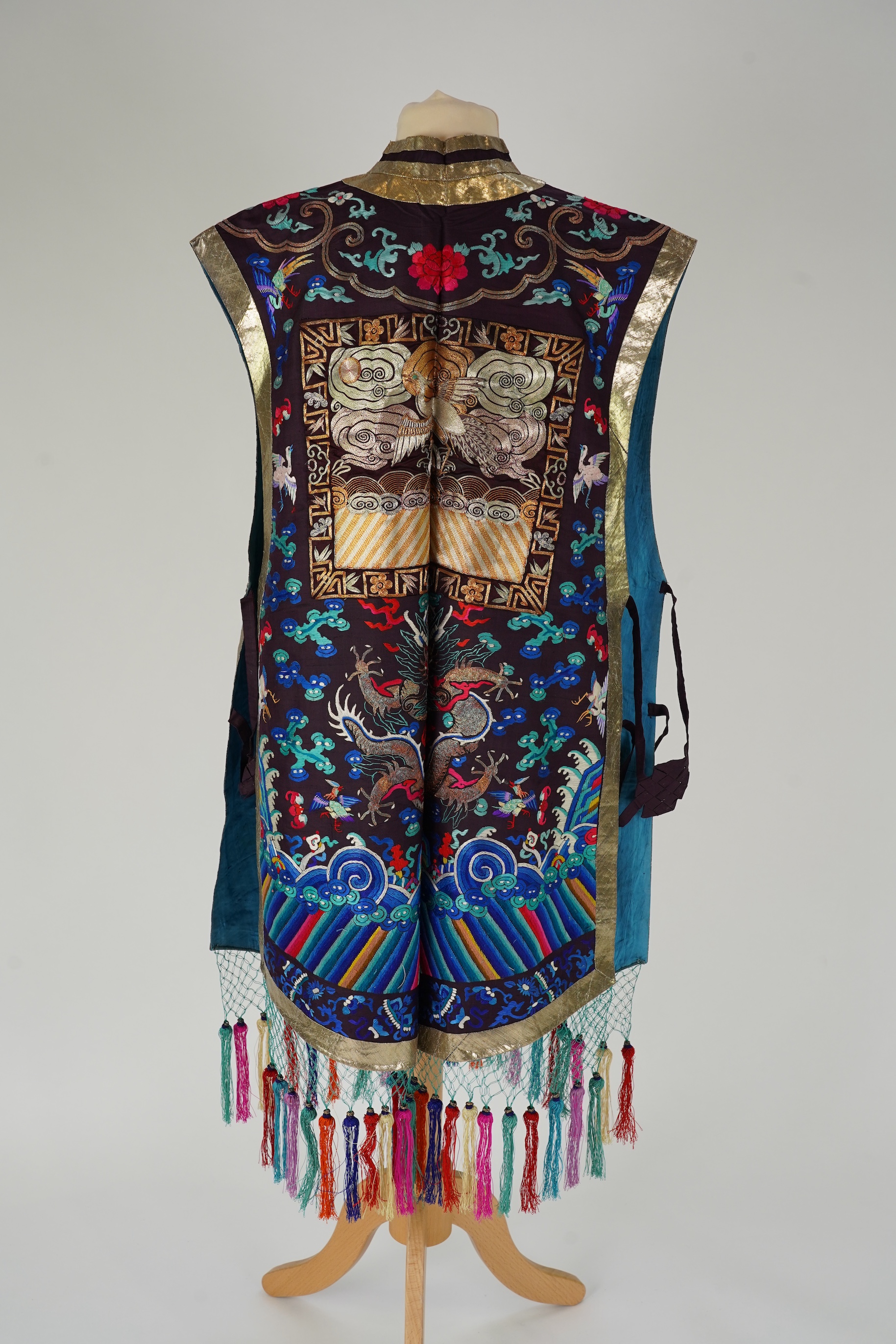 A Chinese embroidered silk vest, xiapei, early 20th century